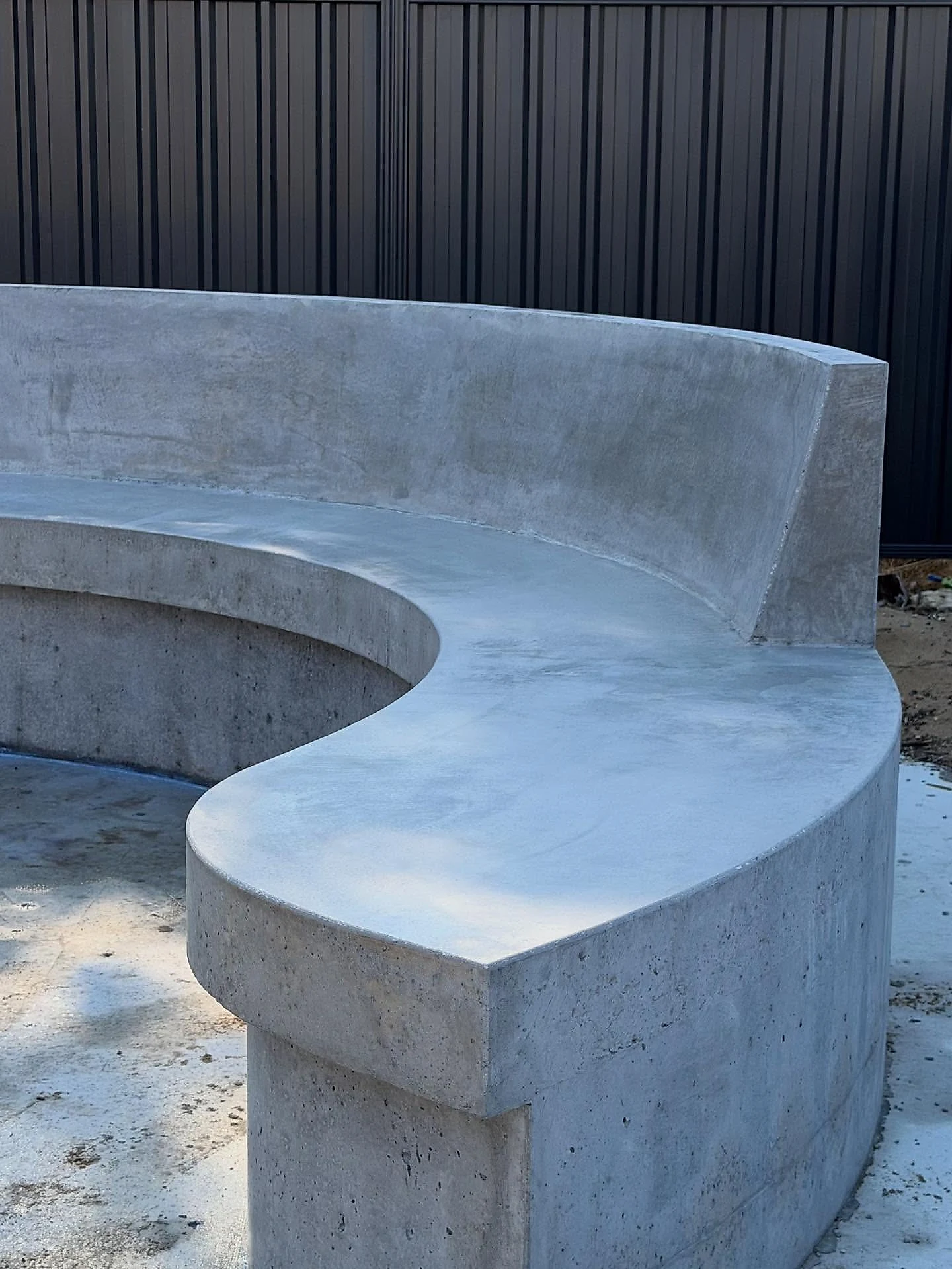 Curved architectural concrete on a Karrinyup new build, set out on site to follow the landscaping line rather 